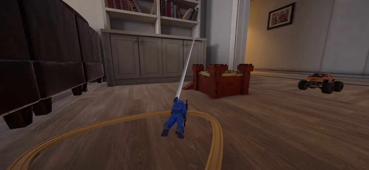 A soldier flies up a hook gun cable past a toy train track, a brick fort and an RC truck